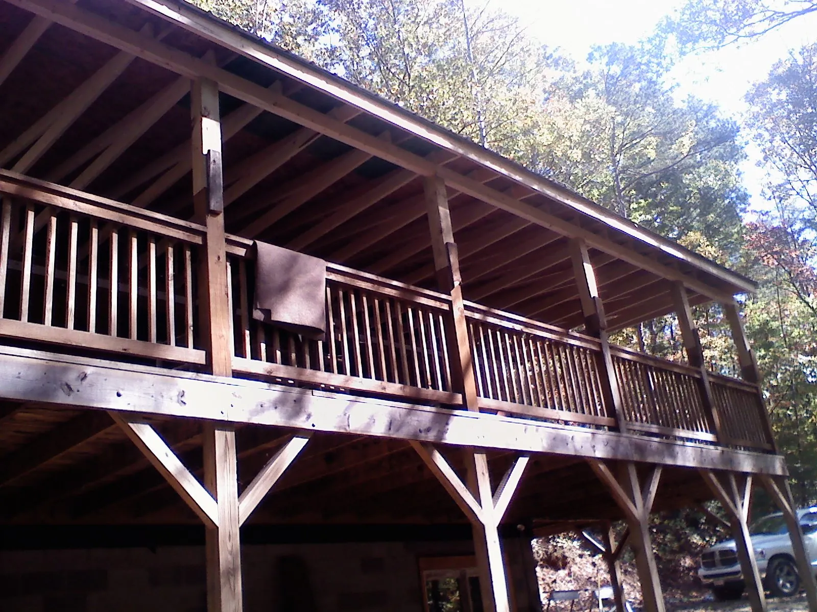 Timber framing under a new elevated porch and deck — Roof Leak Repair in Elkhart by Roofing Brothers